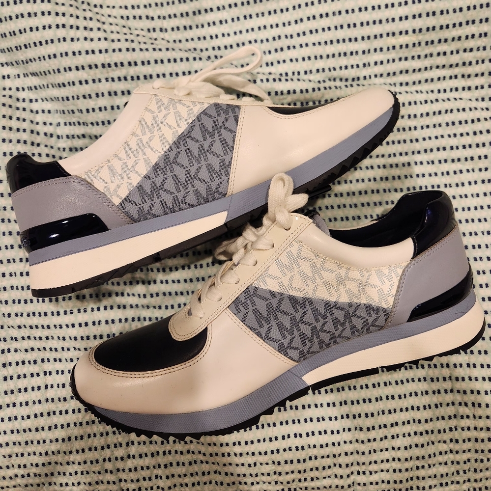 Womens brand new Michael Kors sneakers. Size 10